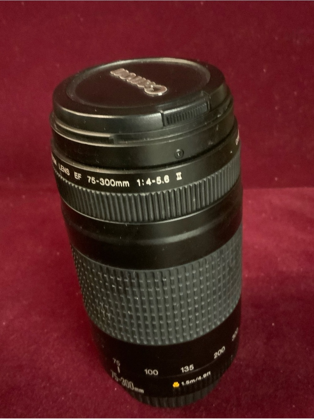 Canon Black 75-300mm f/1.4-5.6 ll Telephoto Zoom Lens with covers. Good cond.